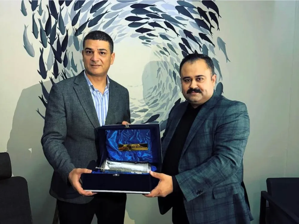 Başkan İnan’dan Başkan Özkan’a Plaket